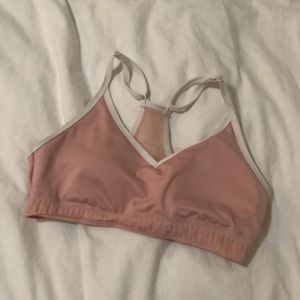 Sports Bra. Light pink with a white outline.
